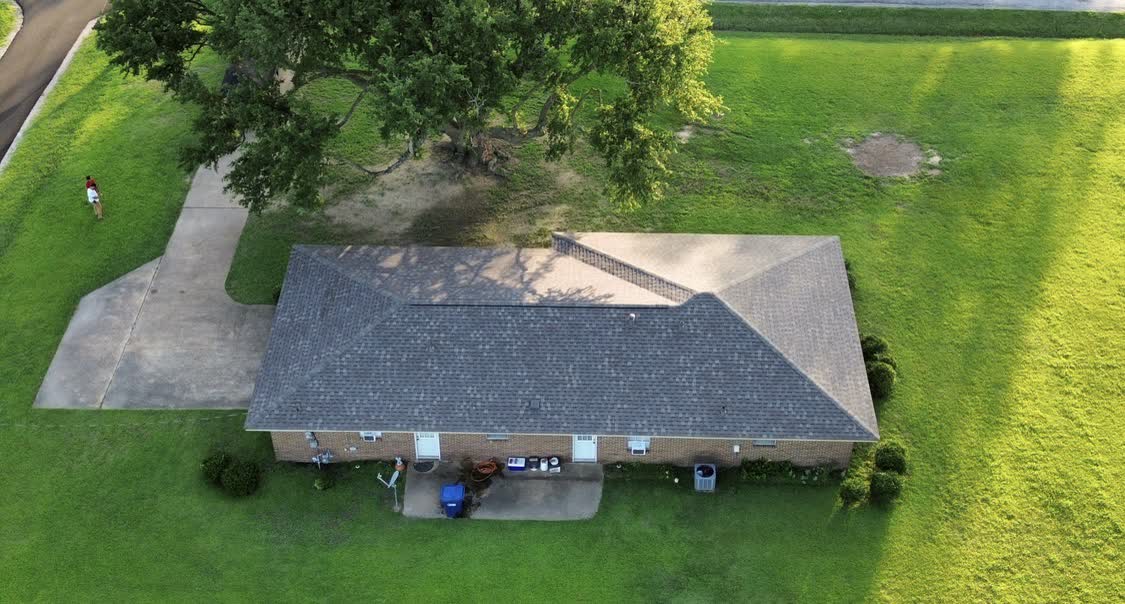 Aerial view of a completed Legacy Roofing project on a Central Mississippi home